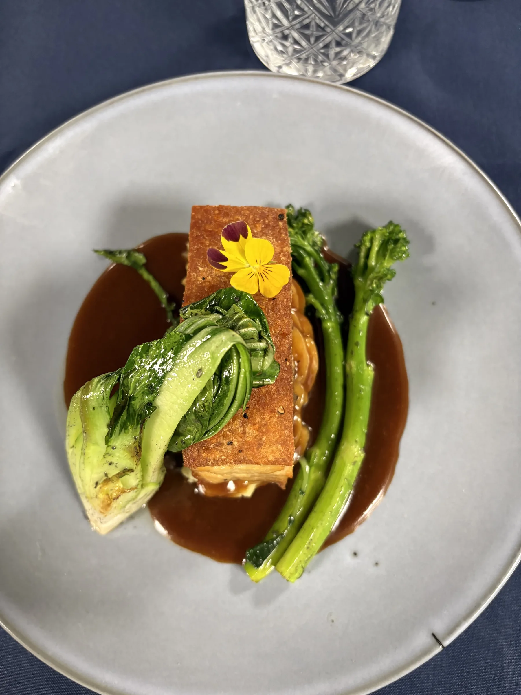 Crispy pork belly with broccolini